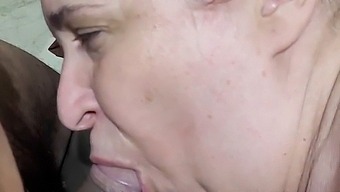Middle-Aged Woman Gives Oral Pleasure To A Young Delivery Guy